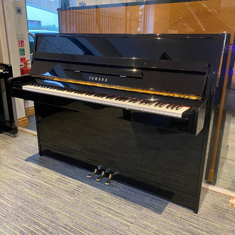 Pre-owned Yamaha C110A upright piano in polished ebony